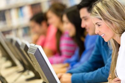 Students study their monitors