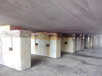 Closeup of docking supports at Navantia, mainly consisting of keel and bilge blocks.