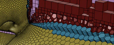 A Mosaic mesh that connects hexahedral elements in the bulk to isotropic elements in the boundary using polyhedral elements