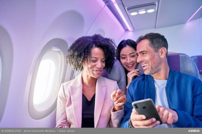 Passengers near a window in an A320 Airspace cabin