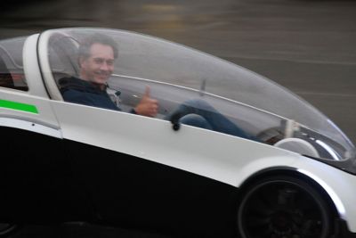 A Podbike R&D team member takes a prototype out for a spin in the rain. 