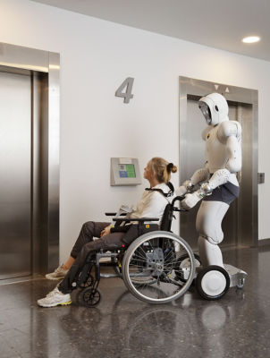 Robot pushing wheelchair