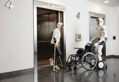 Robot with wheelchair
