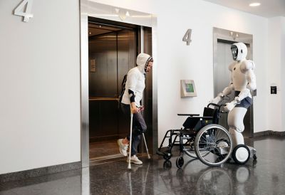 Robot with wheelchair