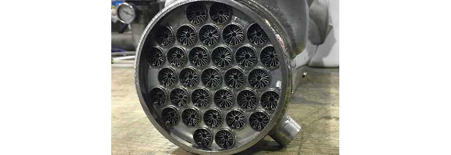 Finned tubes for a compact liquid/air heat exchanger